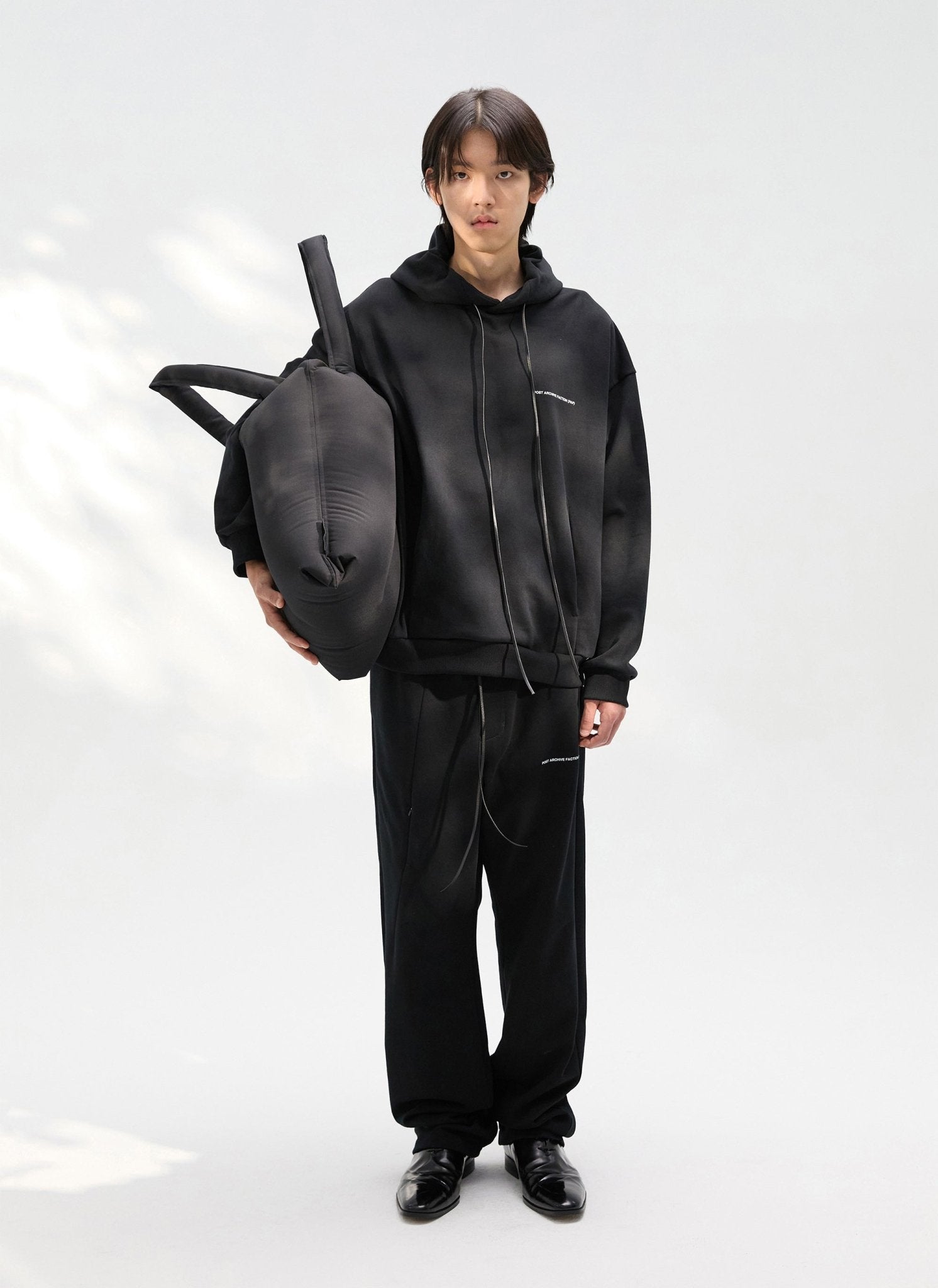 Black 8.0 Knit Right Hoodie by POST ARCHIVE FACTION (PAF) on